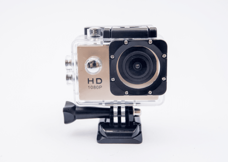 Action camera shown from the front against a white background, featuring an HD 1080p label on the camera.