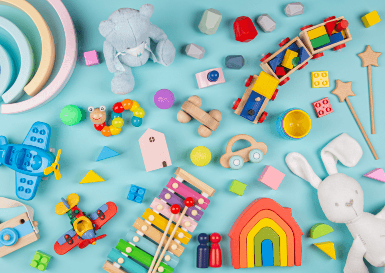 Variety of baby activity toys displayed on a blue background, showcasing colorful textures and engaging designs.