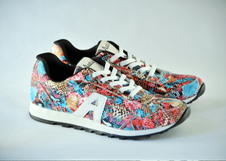 Casual Adidas sneakers featuring vibrant floral colors on a white background, perfect for adding a pop of style to any outfit.