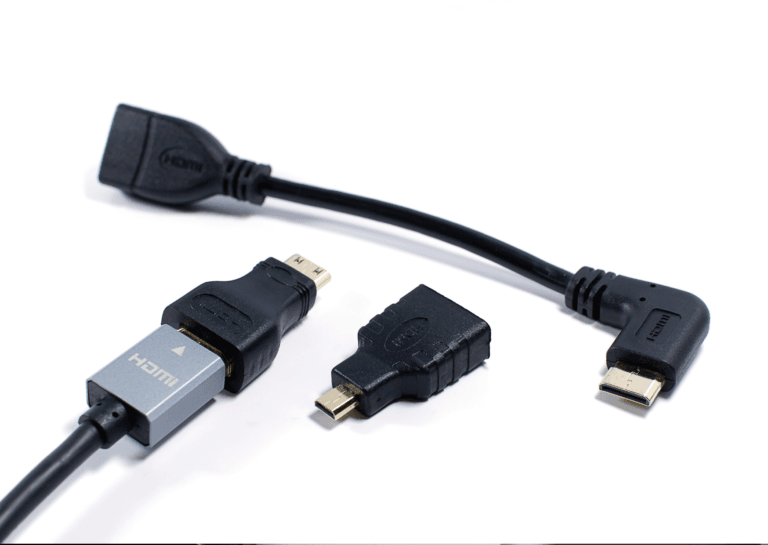 HDMI to USB-C adapters and various other ports displayed on black cables against a white background.