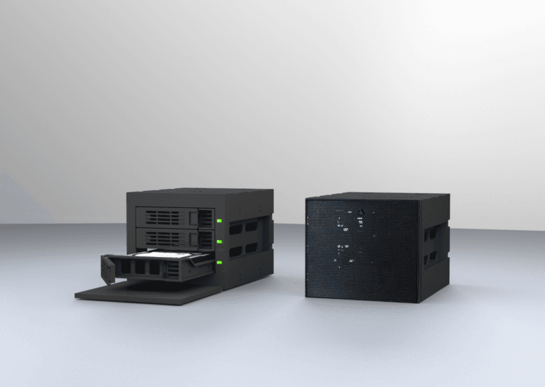 Two black cube-shaped network-attached storage devices, with the left unit featuring an open disk bay, highlighting its storage capability.